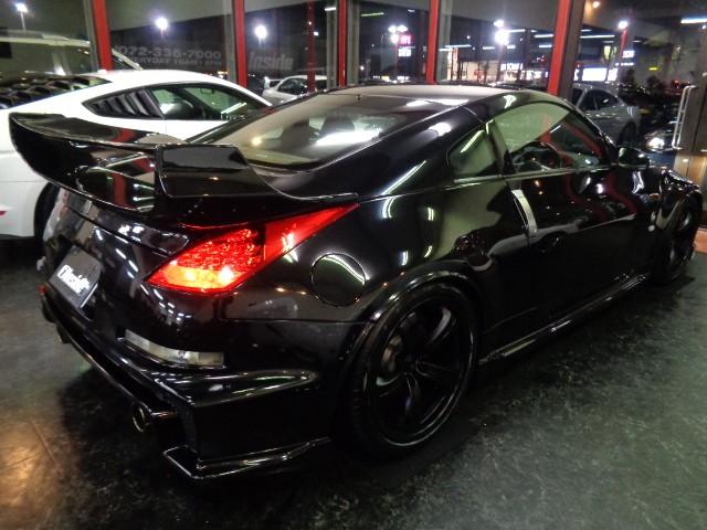 フェアレディZ バージョンニスモ NISMOエアロN1ロングノーズVQ35HRエンジン313PS6MTニスモマフラー車高調ブレンボキャリパーRAYSアルミエアロボンネットニスモ260kmメータ黒革シートVeilsideリアスポナビTV(22枚目)