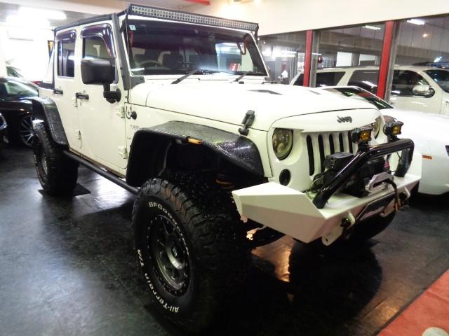 ジープ・ラングラーアンリミテッド スポーツ　３．８Ｖ６エンジンパートタイム４ＷＤ黒幌ＴＯＰオーバーフェンダＢＡＴＴＬＥＺマフラーリフトＵＰサスアイアンバンパー電動ウインチＸＤ１７アルミブロックタイヤ電動サイドステップＬＥＤライトＬＥＤフォグナビ（2枚目）