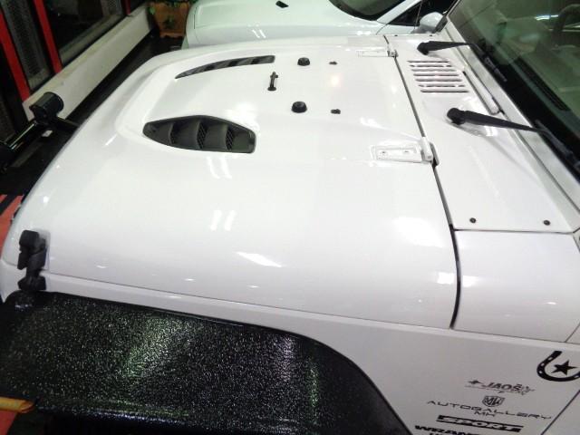 ジープ・ラングラーアンリミテッド スポーツ　３．８Ｖ６エンジンパートタイム４ＷＤ黒幌ＴＯＰオーバーフェンダＢＡＴＴＬＥＺマフラーリフトＵＰサスアイアンバンパー電動ウインチＸＤ１７アルミブロックタイヤ電動サイドステップＬＥＤライトＬＥＤフォグナビ（14枚目）