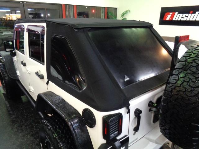 ジープ・ラングラーアンリミテッド スポーツ　３．８Ｖ６エンジンパートタイム４ＷＤ黒幌ＴＯＰオーバーフェンダＢＡＴＴＬＥＺマフラーリフトＵＰサスアイアンバンパー電動ウインチＸＤ１７アルミブロックタイヤ電動サイドステップＬＥＤライトＬＥＤフォグナビ（17枚目）