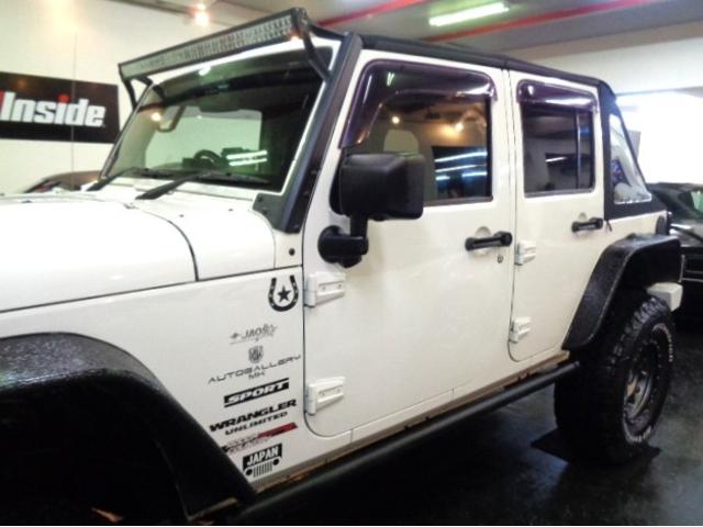 ジープ・ラングラーアンリミテッド スポーツ　３．８Ｖ６エンジンパートタイム４ＷＤ黒幌ＴＯＰオーバーフェンダＢＡＴＴＬＥＺマフラーリフトＵＰサスアイアンバンパー電動ウインチＸＤ１７アルミブロックタイヤ電動サイドステップＬＥＤライトＬＥＤフォグナビ（21枚目）