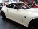 ニスモ　ブリリアントホワイトパールカラーＮＩＳＭＯエアロＶＱ３７ＶＨＲエンジン３５５ＰＳ６ＭＴミッションＮＩＳＭＯマフラー車高調レッドキャリパーＡＤＶＡＮ１９アルミＮＩＳＭＯレカロシートナビＴＶ１オーナー車（24枚目）
