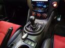 ニスモ　ブリリアントホワイトパールカラーＮＩＳＭＯエアロＶＱ３７ＶＨＲエンジン３５５ＰＳ６ＭＴミッションＮＩＳＭＯマフラー車高調レッドキャリパーＡＤＶＡＮ１９アルミＮＩＳＭＯレカロシートナビＴＶ１オーナー車（32枚目）