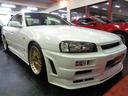 Ｒ３４スカイラインＧＴ４ＤセダンＲ３４ＧＴＲＶスペックＮＩＳＭＯ仕様フルエアロ＆ＲＢ２０ＤＥＮＥＯ６エンジン純正５ＭＴミッション＆車高調ＢＢＳ仕様アルミ他装備充実ライトチューン仕様車が入庫しました