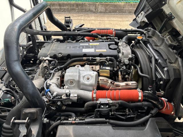 エルフトラック 　２ｔ　冷凍車　冷蔵冷凍車　コンビニ仕様　－５℃設定　東プレ製　ワイドロング　積載量２．０００ｋｇ　床アルミ縞板　ラッシング２段　可動式扉　２層式　２エバ　ＡＴ　オートマ　水抜き穴２か所　サイド扉（46枚目）