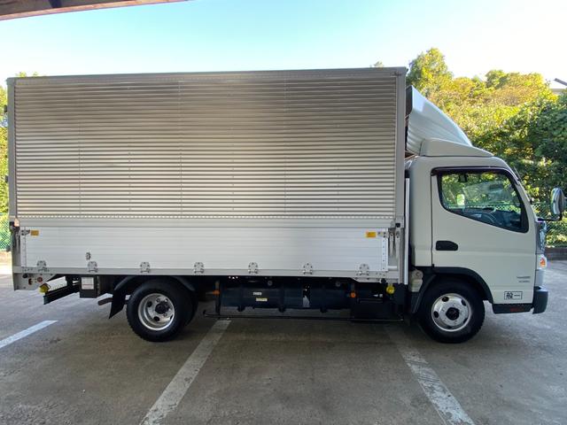 キャンター 　３ｔ　アルミウイング　ウイング　ワイドロング　内高２１４ｃｍ　床木材張り　ラッシング２段　内フック　積載量３．０００ｋｇ　ミッション　ＥＴＣ　バックモニター　ドライブレコーダー　ＣＵＳＴＯＭ　５ＭＴ（26枚目）