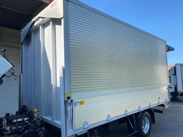 キャンター 　３ｔ　アルミウイング　ウイング　ワイドロング　内高２１４ｃｍ　床木材張り　ラッシング２段　内フック　積載量３．０００ｋｇ　ミッション　ＥＴＣ　バックモニター　ドライブレコーダー　ＣＵＳＴＯＭ　５ＭＴ（61枚目）