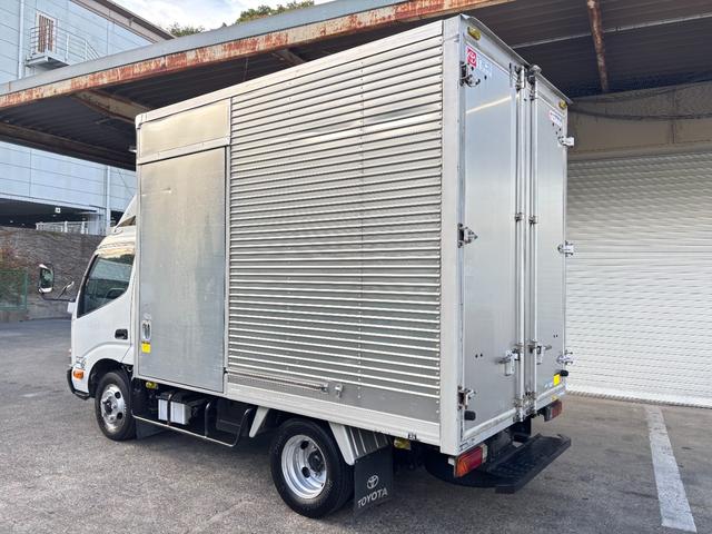 トヨエース 　２ｔ　アルミバン　バン　準中型　１０尺　ショートボディ　９０度ストッパー　ラッシング１段　サイドスライド扉　床木材張り　内高２１６ｃｍ　ＥＴＣ　バックモニター　社外ナビ　積載量２．０００ｋｇ　ＡＴ（7枚目）