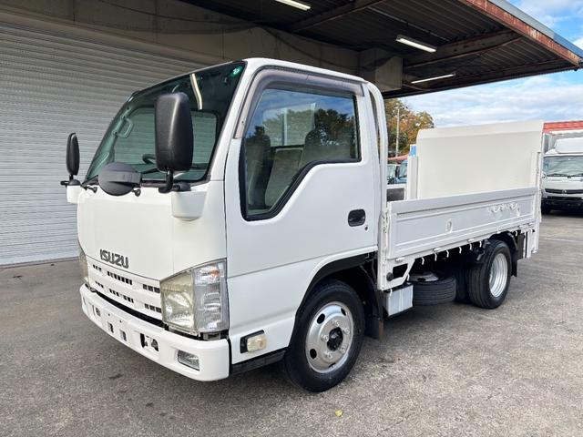 エルフトラック 2t 平ボディ 垂直パワーゲート パワーゲート 準中型 3方開 床鉄板張り ロープ通し穴 積載量2.000kg オートマ AT ショートボディ 10尺 4ナンバー ターボ車 新明和製 電動格納ミラー(2枚目)