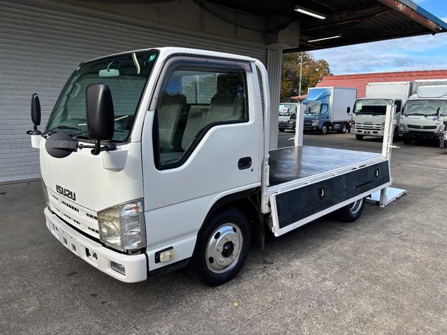 エルフトラック 2t 平ボディ 垂直パワーゲート パワーゲート 準中型 3方開 床鉄板張り ロープ通し穴 積載量2.000kg オートマ AT ショートボディ 10尺 4ナンバー ターボ車 新明和製 電動格納ミラー(19枚目)