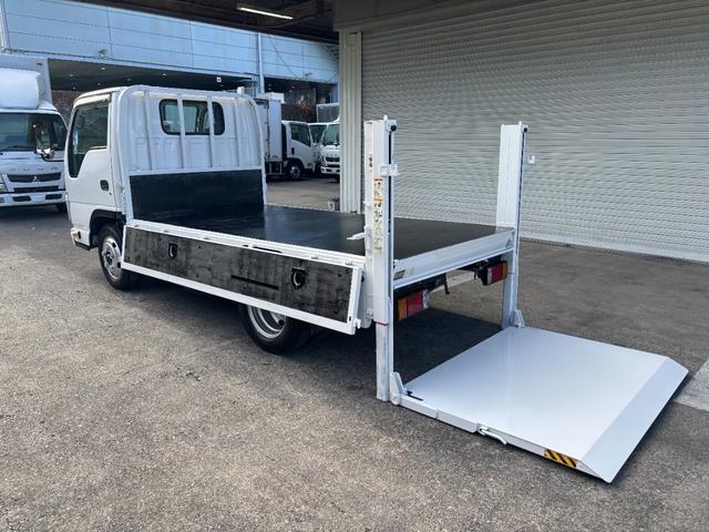 エルフトラック 2t 平ボディ 垂直パワーゲート パワーゲート 準中型 3方開 床鉄板張り ロープ通し穴 積載量2.000kg オートマ AT ショートボディ 10尺 4ナンバー ターボ車 新明和製 電動格納ミラー(23枚目)