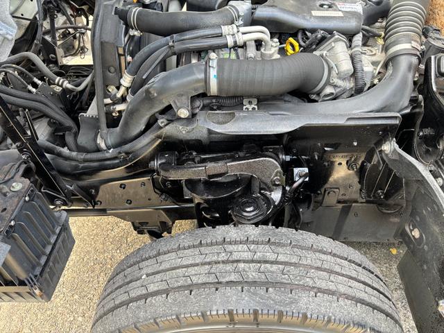 エルフトラック 2t 平ボディ 垂直パワーゲート パワーゲート 準中型 3方開 床鉄板張り ロープ通し穴 積載量2.000kg オートマ AT ショートボディ 10尺 4ナンバー ターボ車 新明和製 電動格納ミラー(41枚目)