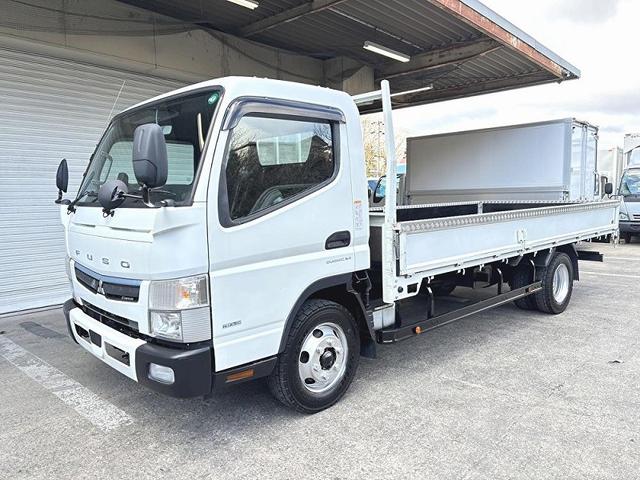 キャンター 　３ｔ　平ボディ　ワイドロング　超ロング　５ｍボディ　３方開　床木材張り　アルミ縞板被せ　デュオニック　ＡＴ　オートマ　２ペダル　ターボ車　３人乗り　坂道補助装置　電動格納ミラー　積載量４．２５０ｋｇ（2枚目）
