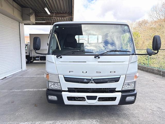 キャンター 　３ｔ　平ボディ　ワイドロング　超ロング　５ｍボディ　３方開　床木材張り　アルミ縞板被せ　デュオニック　ＡＴ　オートマ　２ペダル　ターボ車　３人乗り　坂道補助装置　電動格納ミラー　積載量４．２５０ｋｇ（3枚目）