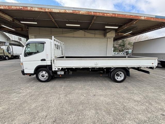 キャンター 　３ｔ　平ボディ　ワイドロング　超ロング　５ｍボディ　３方開　床木材張り　アルミ縞板被せ　デュオニック　ＡＴ　オートマ　２ペダル　ターボ車　３人乗り　坂道補助装置　電動格納ミラー　積載量４．２５０ｋｇ（20枚目）
