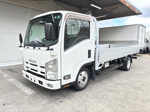 エルフトラック 　２ｔ　平ボディ　アルミブロック　標準ロング　ロング　低床　床木材張り　３方開　ターボ車　ＰＲＩＭＥ　ＥＴＣ　ミッション　５ＭＴ　積載量２．０００ｋｇ　坂道補助装置　電動格納ミラー　ハイキャブ　準中型（2枚目）