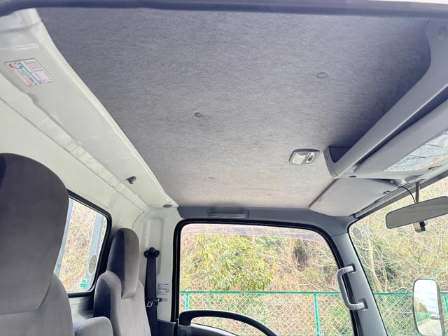 エルフトラック 　２ｔ　平ボディ　アルミブロック　標準ロング　ロング　低床　床木材張り　３方開　ターボ車　ＰＲＩＭＥ　ＥＴＣ　ミッション　５ＭＴ　積載量２．０００ｋｇ　坂道補助装置　電動格納ミラー　ハイキャブ　準中型（24枚目）