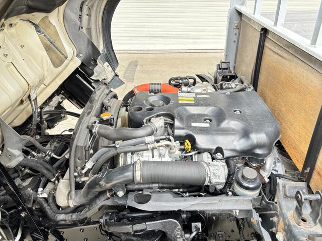 エルフトラック 　２ｔ　平ボディ　アルミブロック　標準ロング　ロング　低床　床木材張り　３方開　ターボ車　ＰＲＩＭＥ　ＥＴＣ　ミッション　５ＭＴ　積載量２．０００ｋｇ　坂道補助装置　電動格納ミラー　ハイキャブ　準中型（36枚目）