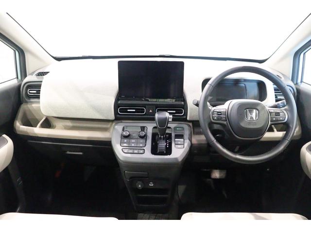 フリード ｅ：ＨＥＶエアー　ＥＸ　バックカメラ　ナビ　ＴＶ　クリアランスソナー　クルーズコントロール　レーンアシスト　衝突被害軽減システム　両側電動スライドドア　ＬＥＤヘッドランプ　スマートキー　アイドリングストップ（2枚目）