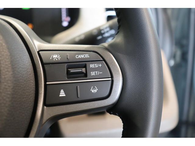 フリード ｅ：ＨＥＶエアー　ＥＸ　バックカメラ　ナビ　ＴＶ　クリアランスソナー　クルーズコントロール　レーンアシスト　衝突被害軽減システム　両側電動スライドドア　ＬＥＤヘッドランプ　スマートキー　アイドリングストップ（11枚目）