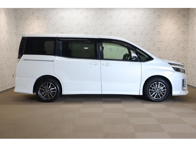 ヴォクシー ＺＳ　ＥＴＣ　バックカメラ　ナビ　ＴＶ　レーンアシスト　衝突被害軽減システム　両側電動スライドドア　オートマチックハイビーム　ＬＥＤヘッドランプ　スマートキー　アイドリングストップ　後席モニター　３列シート（14枚目）