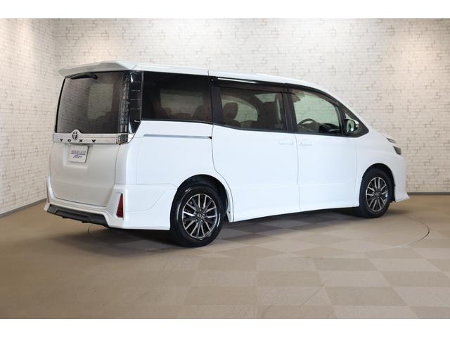 ヴォクシー ＺＳ　ＥＴＣ　バックカメラ　ナビ　ＴＶ　レーンアシスト　衝突被害軽減システム　両側電動スライドドア　オートマチックハイビーム　ＬＥＤヘッドランプ　スマートキー　アイドリングストップ　後席モニター　３列シート（15枚目）