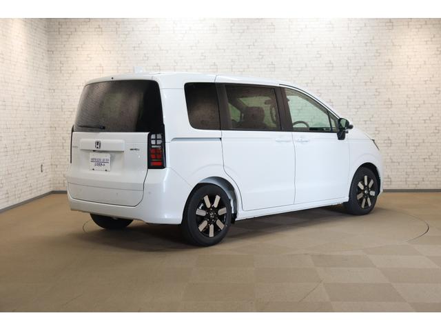 フリード ｅ：ＨＥＶエアー　ＥＸ　クリアランスソナー　クルーズコントロール　レーンアシスト　衝突被害軽減システム　両側電動スライドドア　オートライト　ＬＥＤヘッドランプ　スマートキー　アイドリングストップ　電動格納ミラー（15枚目）