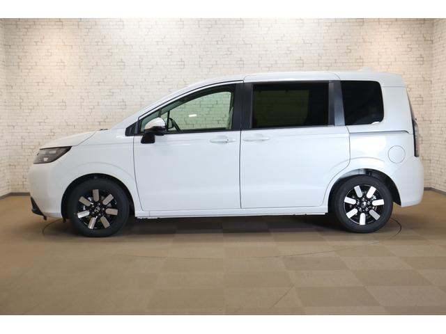 フリード ｅ：ＨＥＶエアー　ＥＸ　クリアランスソナー　クルーズコントロール　レーンアシスト　衝突被害軽減システム　両側電動スライドドア　オートライト　ＬＥＤヘッドランプ　スマートキー　アイドリングストップ　電動格納ミラー（18枚目）