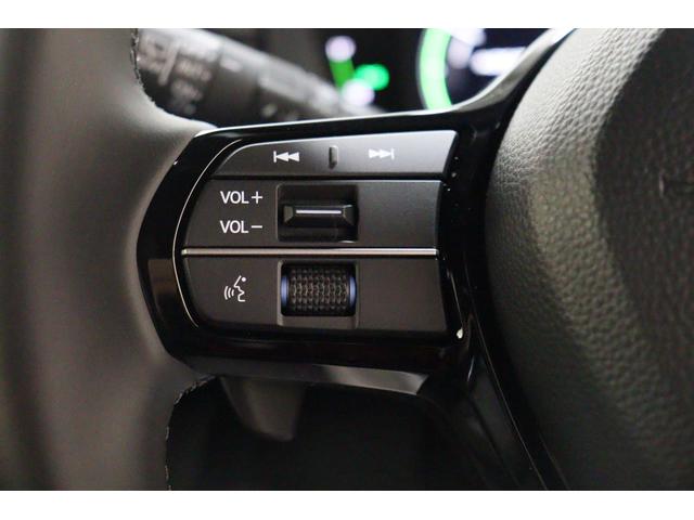 ステップワゴン ｅ：ＨＥＶスパーダ　バックカメラ　クリアランスソナー　クルーズコントロール　レーンアシスト　衝突被害軽減システム　両側電動スライドドア　オートライト　ＬＥＤヘッドランプ　スマートキー　シートヒーター　３列シート（9枚目）