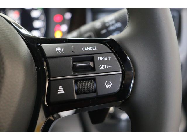 ステップワゴン ｅ：ＨＥＶスパーダ　バックカメラ　クリアランスソナー　クルーズコントロール　レーンアシスト　衝突被害軽減システム　両側電動スライドドア　オートライト　ＬＥＤヘッドランプ　スマートキー　シートヒーター　３列シート（10枚目）