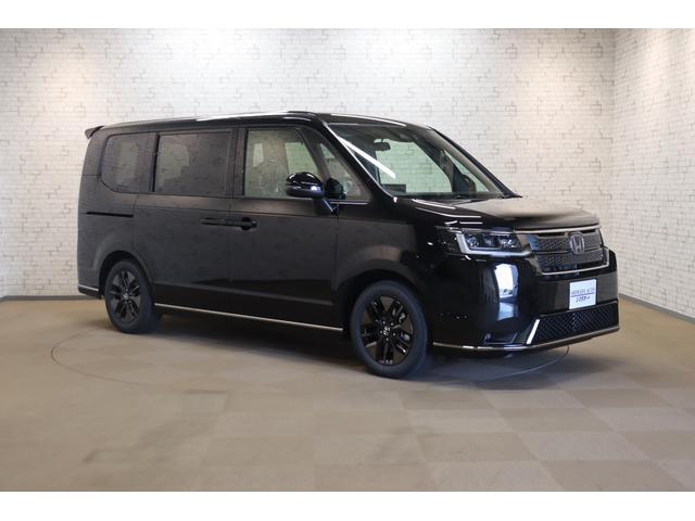 ステップワゴン ｅ：ＨＥＶスパーダ　バックカメラ　クリアランスソナー　クルーズコントロール　レーンアシスト　衝突被害軽減システム　両側電動スライドドア　オートライト　ＬＥＤヘッドランプ　スマートキー　シートヒーター　３列シート（14枚目）