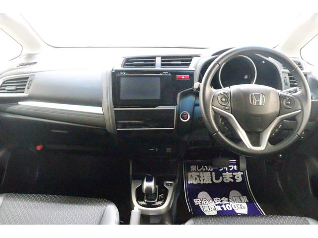 フィットハイブリッド Ｌパッケージ　ハイブリッド　ＥＴＣ　バックカメラ　ナビ　クルーズコントロール　衝突被害軽減システム　ＬＥＤヘッドランプ　スマートキー　ＡＴ　盗難防止システム　衝突安全ボディ　ＣＤ　ＵＳＢ　Ｂｌｕｅｔｏｏｔｈ（2枚目）