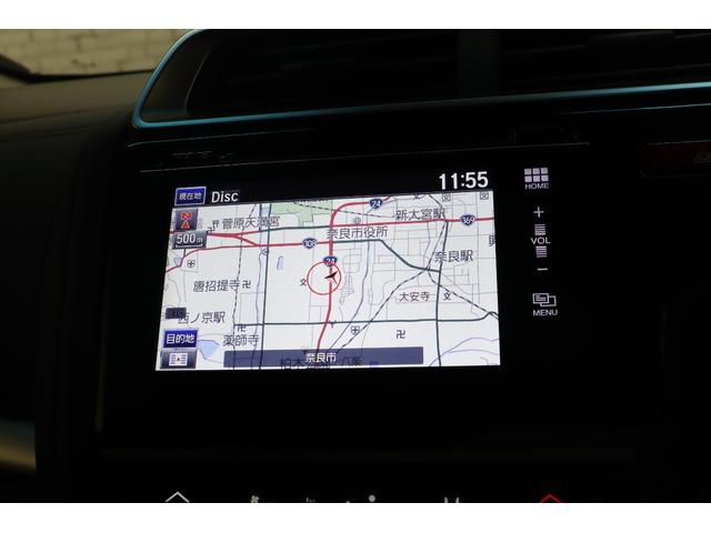 フィットハイブリッド Ｌパッケージ　ハイブリッド　ＥＴＣ　バックカメラ　ナビ　クルーズコントロール　衝突被害軽減システム　ＬＥＤヘッドランプ　スマートキー　ＡＴ　盗難防止システム　衝突安全ボディ　ＣＤ　ＵＳＢ　Ｂｌｕｅｔｏｏｔｈ（3枚目）