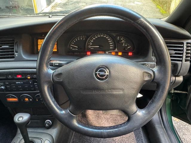 ベクトラ ＣＤ　走行１万ｋｍ　純正１５インチホイール　ＥＣＯＴＥＣエンジン　カラーＣＤ３６９　ＲＩＯ　ＶＥＲＤＥ　ＰＥＡＲＬ　ＭＥＴ（34枚目）
