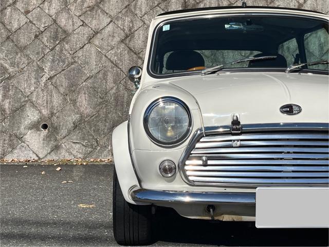 ＭＩＮＩ クーパー　４速クイックシフトＭＴ　センターマフラー　社外サスペンション　１２インチホイール　ウッドステアリング　ＥＴＣ車載器　新品タイヤ交換後納車（13枚目）