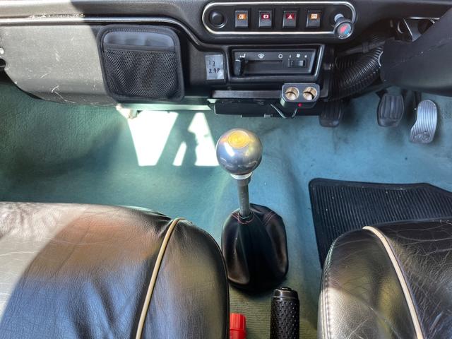 ＭＩＮＩ クーパー　４速クイックシフトＭＴ　センターマフラー　社外サスペンション　１２インチホイール　ウッドステアリング　ＥＴＣ車載器　新品タイヤ交換後納車（29枚目）