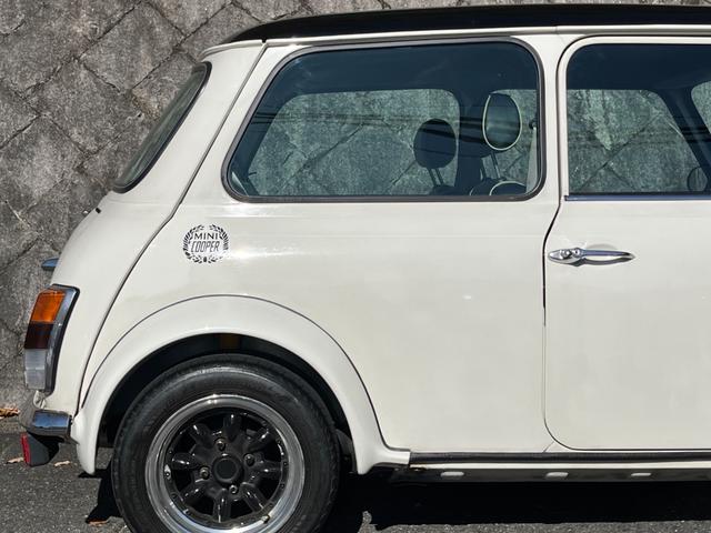 ＭＩＮＩ クーパー　４速クイックシフトＭＴ　センターマフラー　社外サスペンション　１２インチホイール　ウッドステアリング　ＥＴＣ車載器　新品タイヤ交換後納車（38枚目）