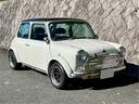 ＭＩＮＩ クーパー　４速クイックシフトＭＴ　センターマフラー　社外サスペンション　１２インチホイール　ウッドステアリング　ＥＴＣ車載器　新品タイヤ交換後納車（5枚目）