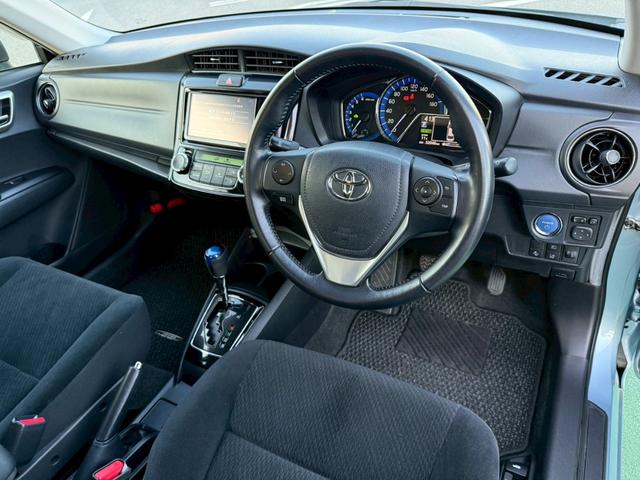 カローラアクシオ ハイブリッドＧ　禁煙車／純正ナビ／フルセグＴＶ／Ｂｌｕｅｔｏｏｔｈ／バックカメラ／ＥＴＣ／回転シート／プッシュスタート／スマートキー／ステアリングリモコン／スペアキー／ＤＶＤ再生（6枚目）