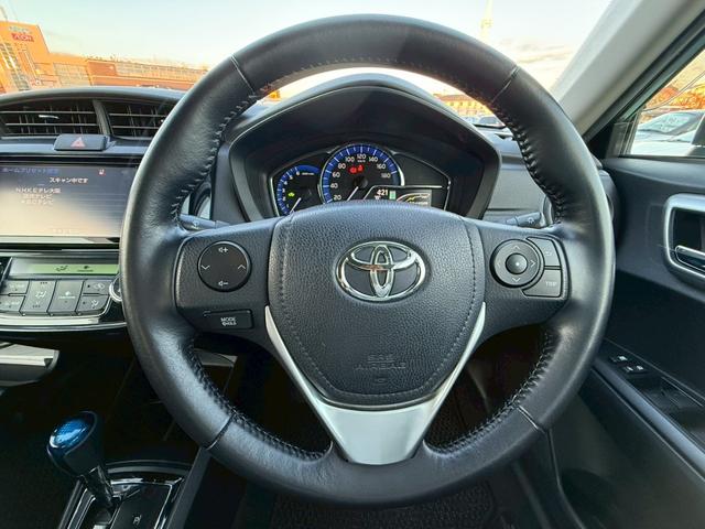 カローラアクシオ ハイブリッドＧ　禁煙車／純正ナビ／フルセグＴＶ／Ｂｌｕｅｔｏｏｔｈ／バックカメラ／ＥＴＣ／回転シート／プッシュスタート／スマートキー／ステアリングリモコン／スペアキー／ＤＶＤ再生（16枚目）