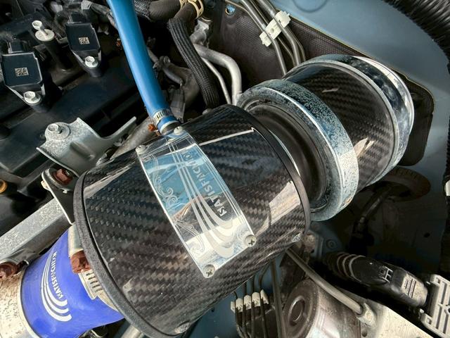 ジムニー ＸＬ　禁煙車／５ＭＴ／リフトアップ車／ブロックタイヤ／サティスファクションエアクリ／マフラー／シートヒーター／Ｐａｎａｓｏｎｉｃナビ／Ｂｌｕｅｔｏｏｔｈ／テレビ／ドラレコ／プッシュスタート／スマートキー／（6枚目）