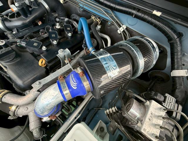 ジムニー ＸＬ　禁煙車／５ＭＴ／リフトアップ車／ブロックタイヤ／サティスファクションエアクリ／マフラー／シートヒーター／Ｐａｎａｓｏｎｉｃナビ／Ｂｌｕｅｔｏｏｔｈ／テレビ／ドラレコ／プッシュスタート／スマートキー／（51枚目）