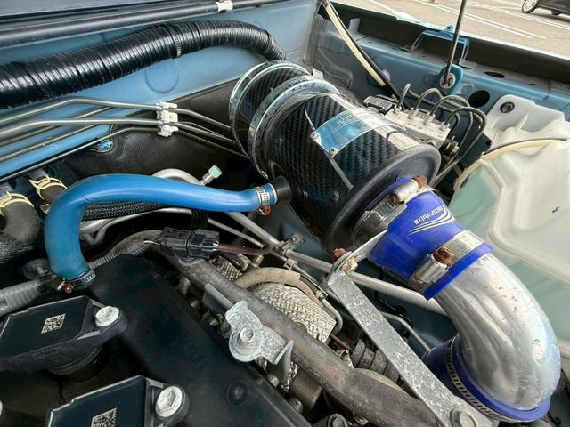 ジムニー ＸＬ　禁煙車／５ＭＴ／リフトアップ車／ブロックタイヤ／サティスファクションエアクリ／マフラー／シートヒーター／Ｐａｎａｓｏｎｉｃナビ／Ｂｌｕｅｔｏｏｔｈ／テレビ／ドラレコ／プッシュスタート／スマートキー／（52枚目）