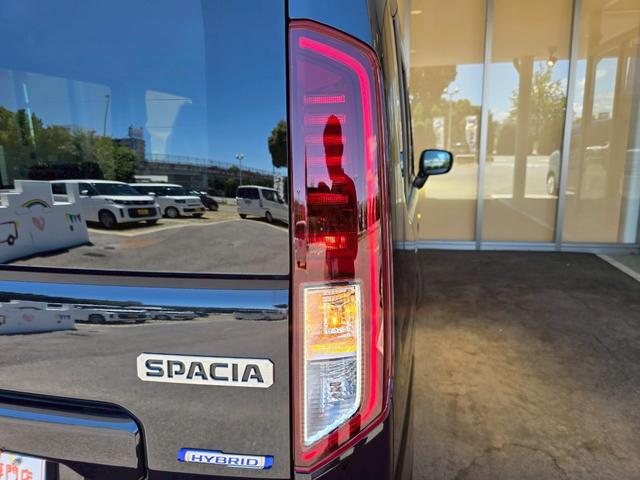 スペーシア ハイブリッドG 届出済未使用車 禁煙車 衝突被害軽減ブレーキ 両側スライドドア オートライト 電動格納式ミラー オートエアコン アイドリングストップ 横滑り防止機能 アクセサリーソケット マニュアルレベリング機能(18枚目)