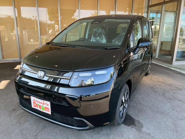 フリード ｅ：ＨＥＶエアー　ＥＸ　登録済未使用車　ＨｏｎｄａＳＥＮＳＩＮＧ　両側電動スライドドア　アダプティブクルーズコントロール　禁煙車　純正アルミホイール　ＬＥＤヘッドライト　シートヒーター　電子パーキング　オートブレーキホールド（6枚目）