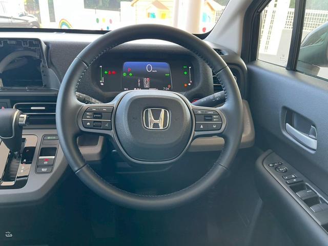 フリード ｅ：ＨＥＶエアー　ＥＸ　登録済未使用車　ＨｏｎｄａＳＥＮＳＩＮＧ　両側電動スライドドア　アダプティブクルーズコントロール　禁煙車　純正アルミホイール　ＬＥＤヘッドライト　シートヒーター　電子パーキング　オートブレーキホールド（32枚目）