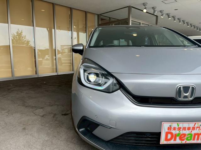 フィット ホーム 純正ナビ バックカメラ ETC 衝突被害軽減ブレーキ 電子パーキング オートブレーキホールド アダプティブクルーズコントロール オートライト 電動格納式ミラー アイドリングストップ(20枚目)