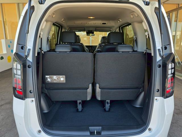 フリード エアー EX 登録済未使用車 両側電動スライドドア HondaSENSING アダプティブクルーズコントロール 純正アルミホイール 前席シートヒーター 電子パーキング オートブレーキホールド ロールサンシェード(14枚目)