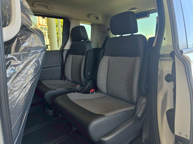 フリード エアー EX 登録済未使用車 両側電動スライドドア HondaSENSING アダプティブクルーズコントロール 純正アルミホイール 前席シートヒーター 電子パーキング オートブレーキホールド ロールサンシェード(29枚目)