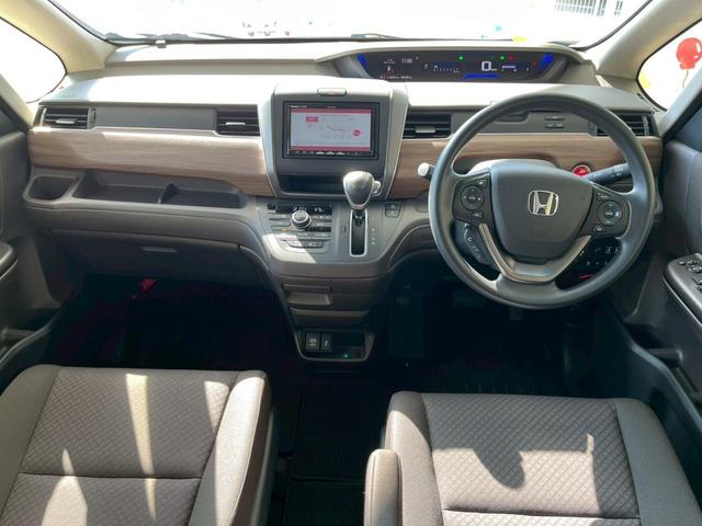 フリード G ナビ バックカメラ Bluetooth ETC HondaSENSING 両側電動スライドドア クルーズコントロール シートヒーター スマートキー ステアリングスイッチ ロールサンシェード USB充電(30枚目)